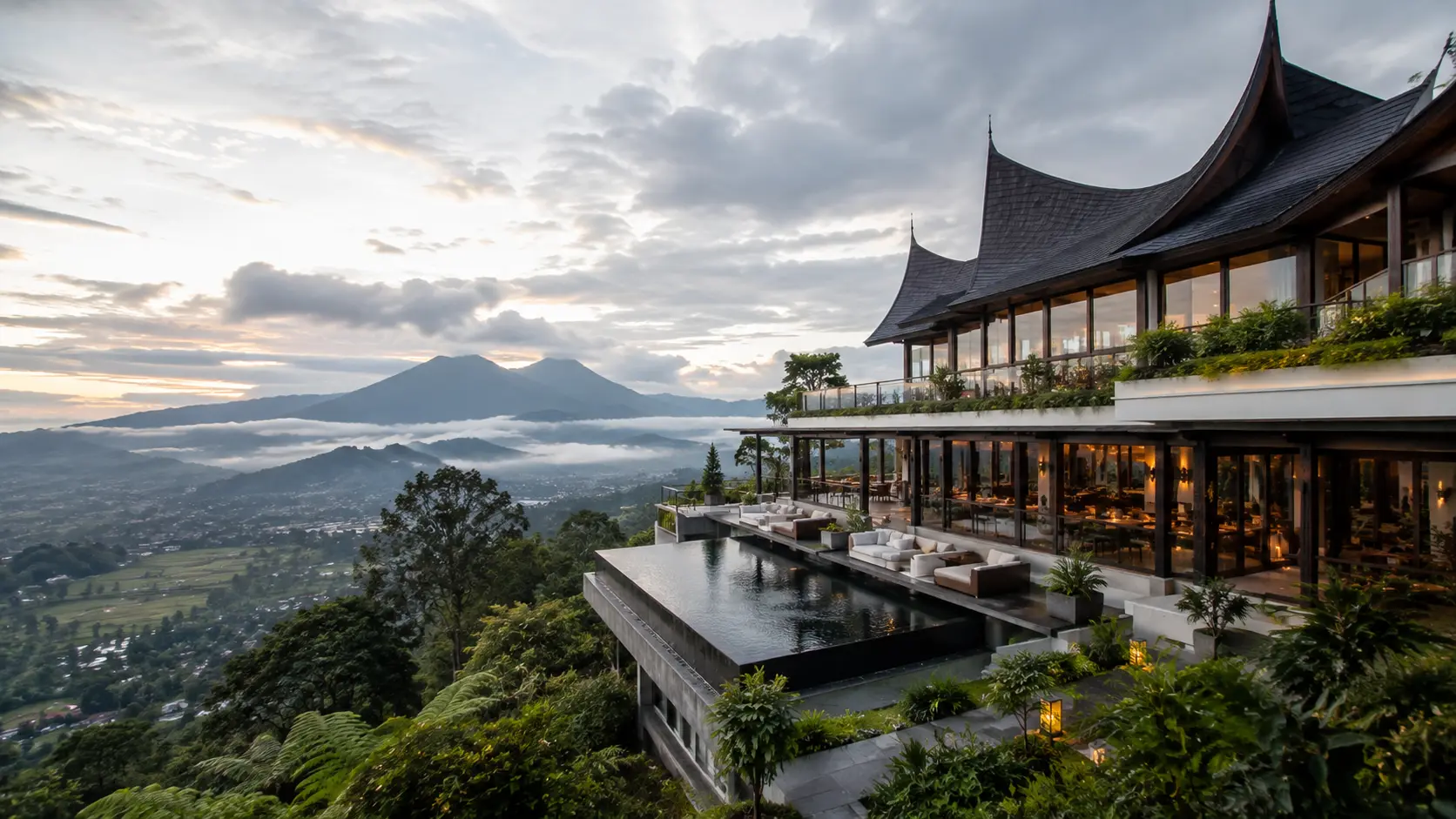 Hotel di Bukittinggi dengan pemandangan perbukitan hijau.